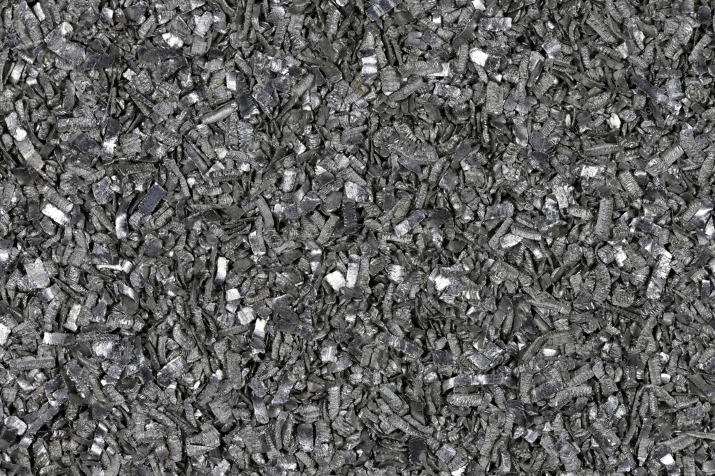 Close-up of raw magnesium metal fragments highlighting global magnesium supply risks and the need for recycling and new sourcing solutions.